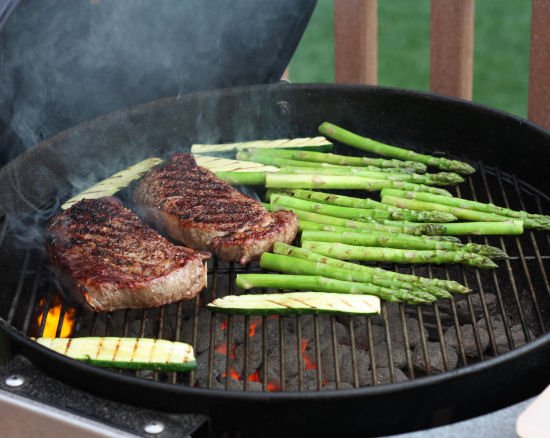 Costco Ribeye Steaks on a charcoal grill