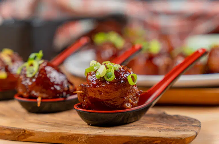 BBQ bacon wrapped pork meatballs with bbq sauce