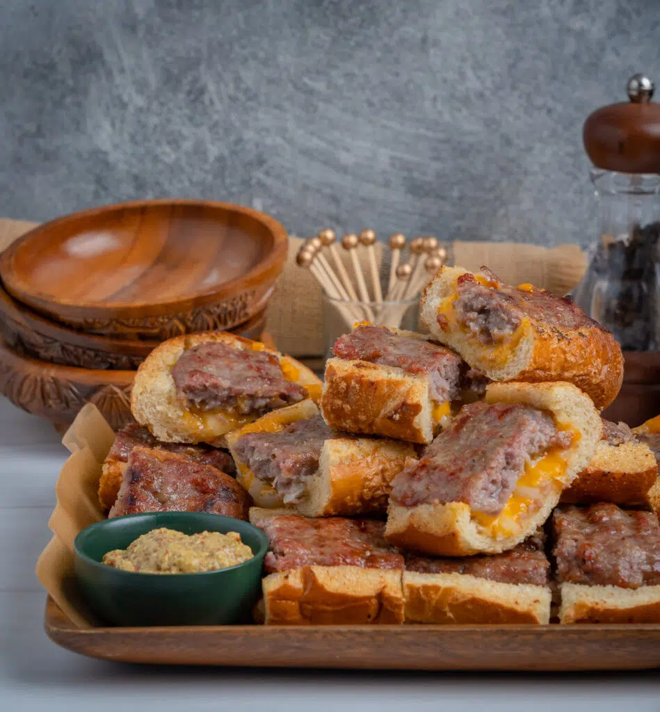 tailgate appetizer of brat bread served with whole grain mustard