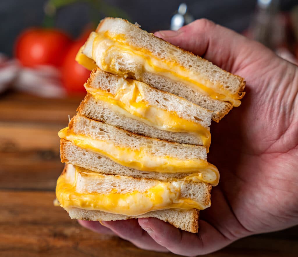 grilled cheese cut into quarters and stacked 