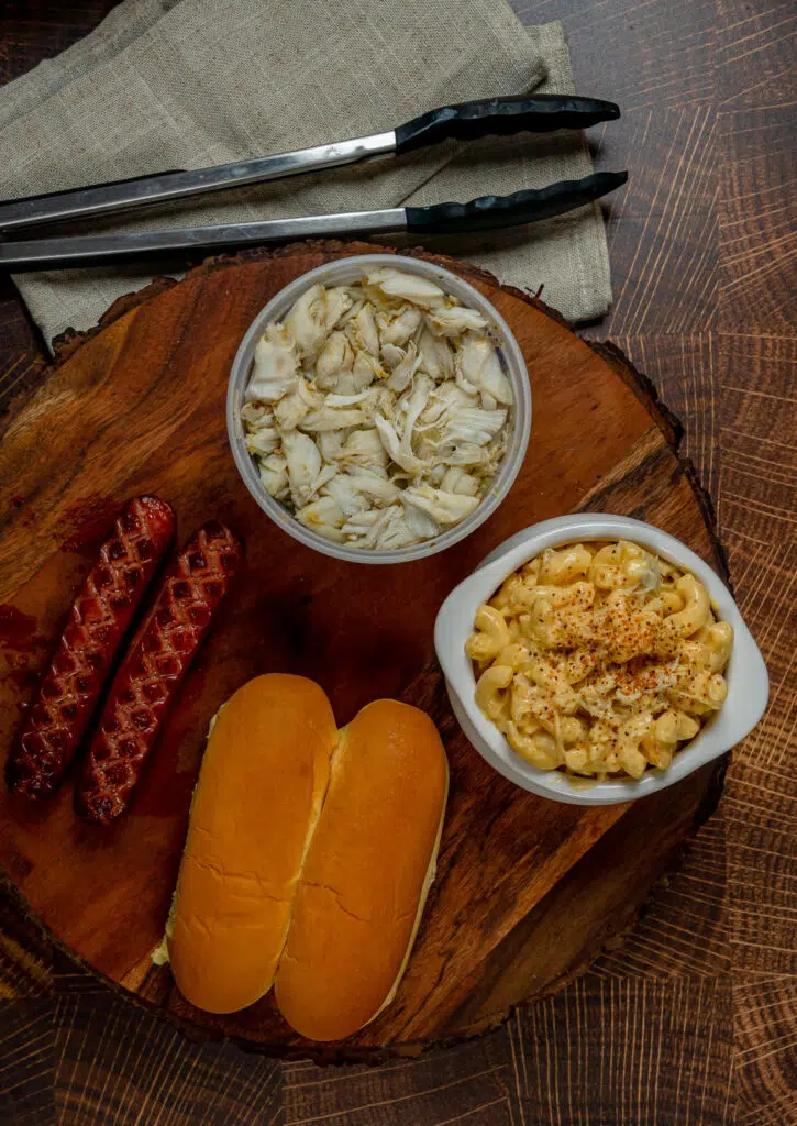 Ingredients to make crab Mac and cheese hot dogs