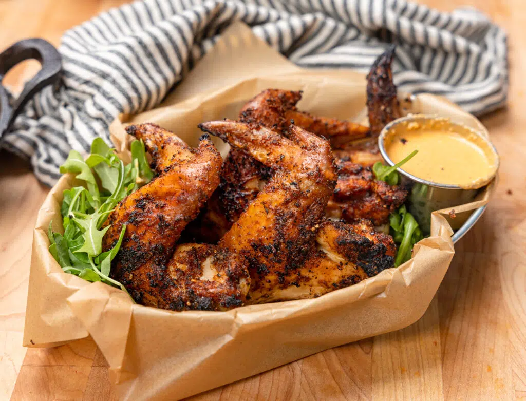 grilled chicken wings in a basket