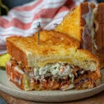 pulled pork grilled cheese with pickles and coleslaw