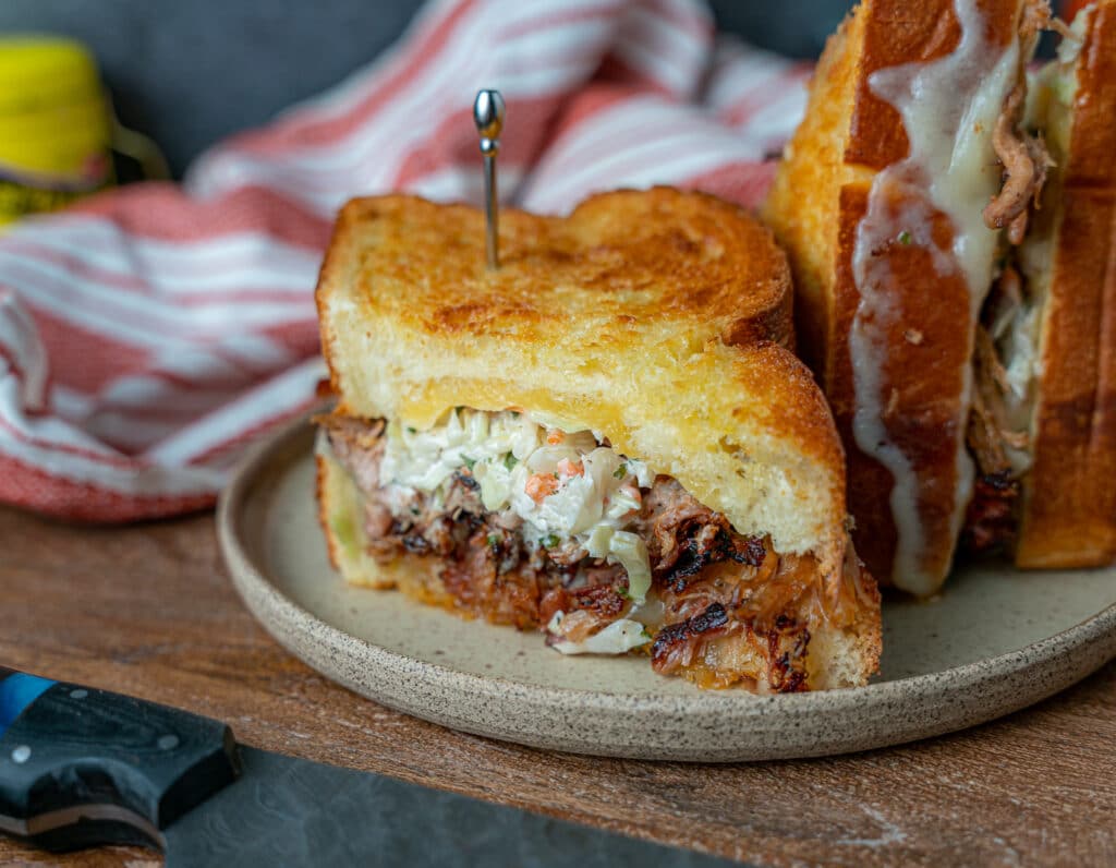 pulled pork with classic coleslaw served on thick cut bread