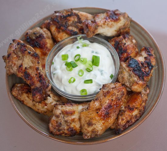 Jerked chicken wing marinade recipe with a cool green onion dipping sauce - Grilling24x7