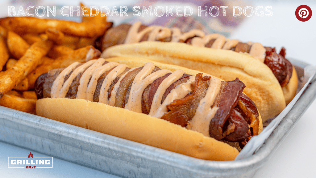 bacon cheddar smoked hot dogs topped with onion ring zesty sauce