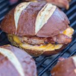 Grilled Ham Steak and Cheese on a Pretzel Roll - Grilling24x7