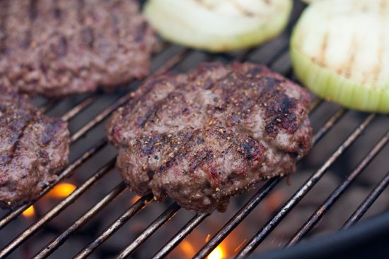 grilling a loose packed ground beef burger patty