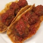 Keto meatball subs using provolone cheese a the bun
