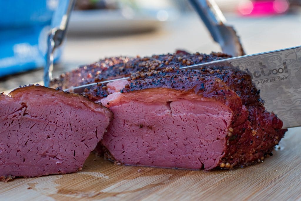 knife slicing corned beef