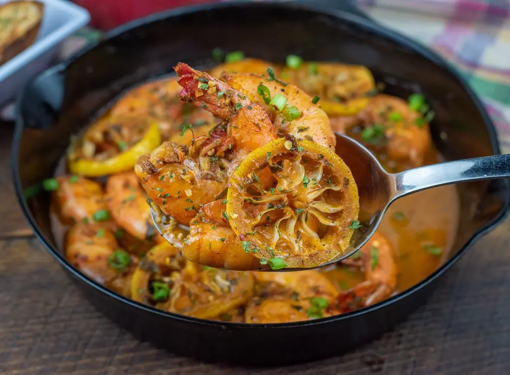 New Orleans Style Barbecue Shrimp in cast iron skillet