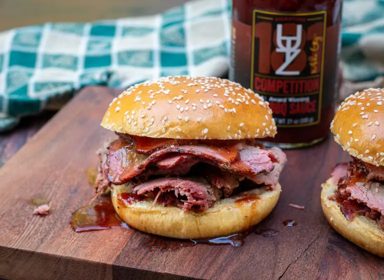 Smoked Eye round on a sesame seed roll with bbq sauce