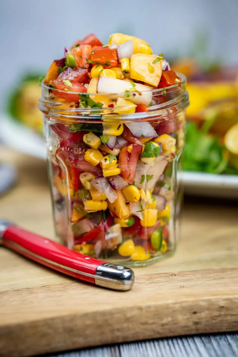 fresh peach & corn salsa served in a jar