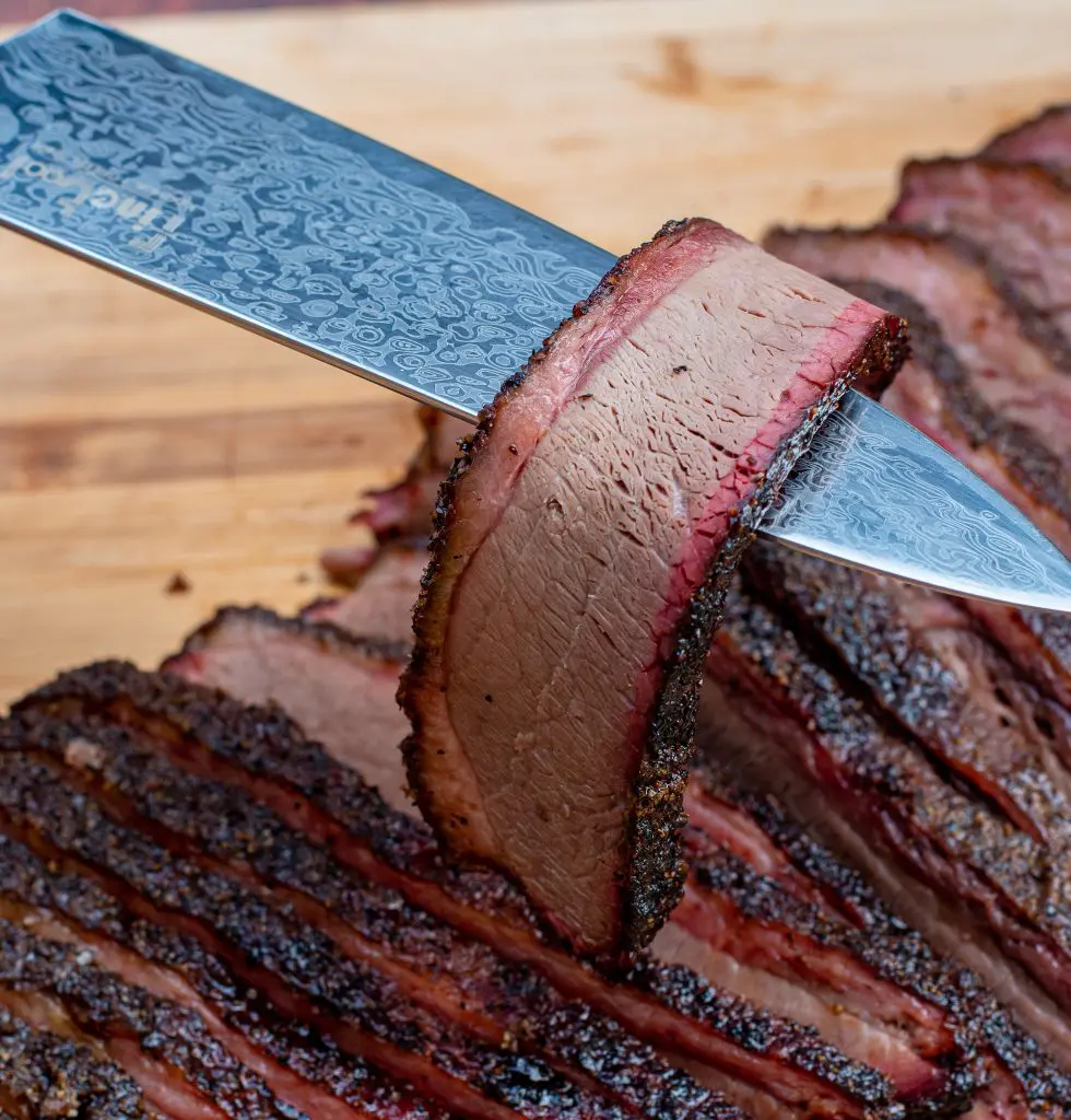 sliced beef brisket exposing smoke ring