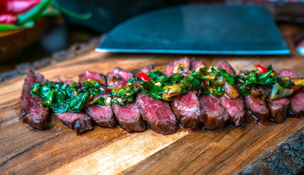 Wagyu Denver Steak topped with thai style chimichurri sauce