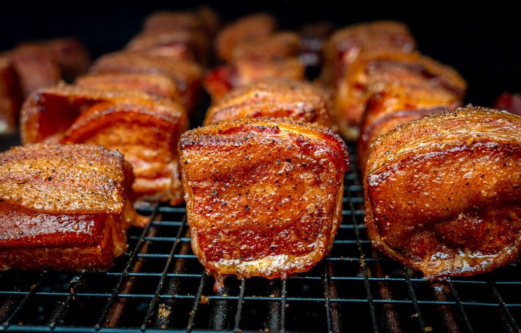 smoked bacon wrapped in bacon with dry rub seasoning