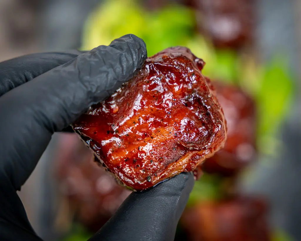 slab bacon wrapped in bacon glazed with bbq sauce