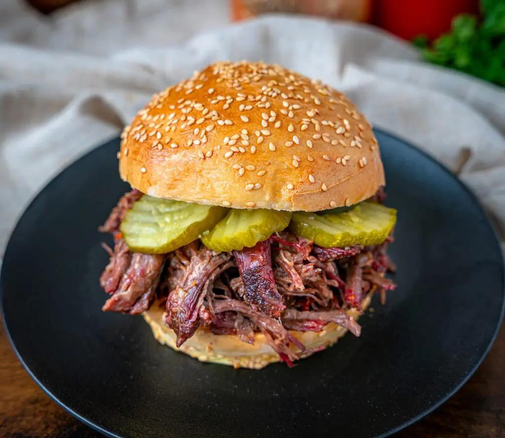 smoked pulled chuck roast sandwich with pickles