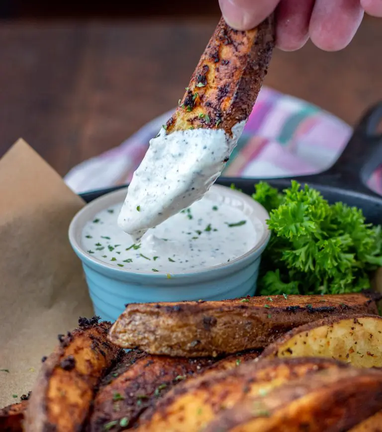 Spicy horseradish aioli served with potato wedges