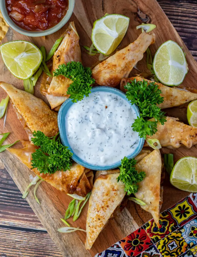 Chicken fajita egg rolls in the air fryer served with each dipping sauce