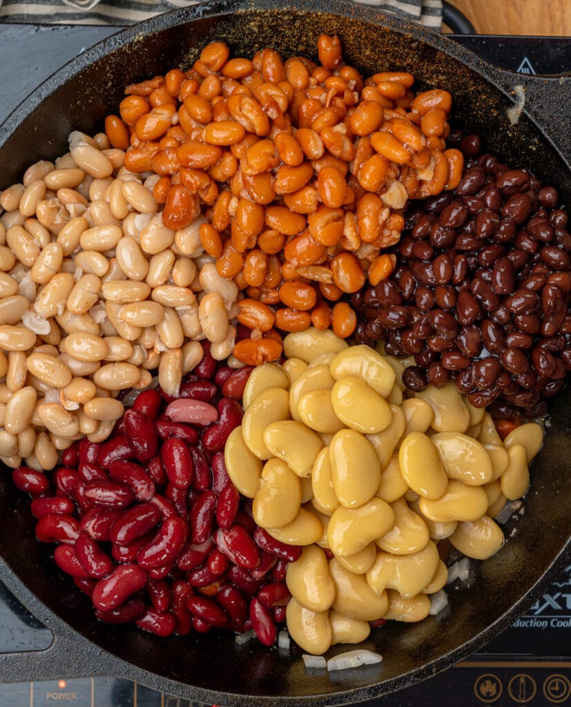 five different types of beans in a pot