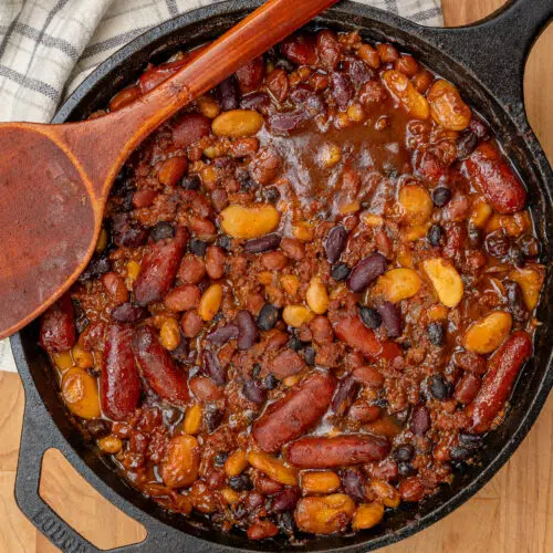 overhead view of cast iron smoked baked beans