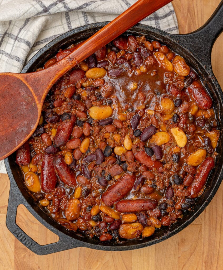 overhead view of cast iron smoked baked beans