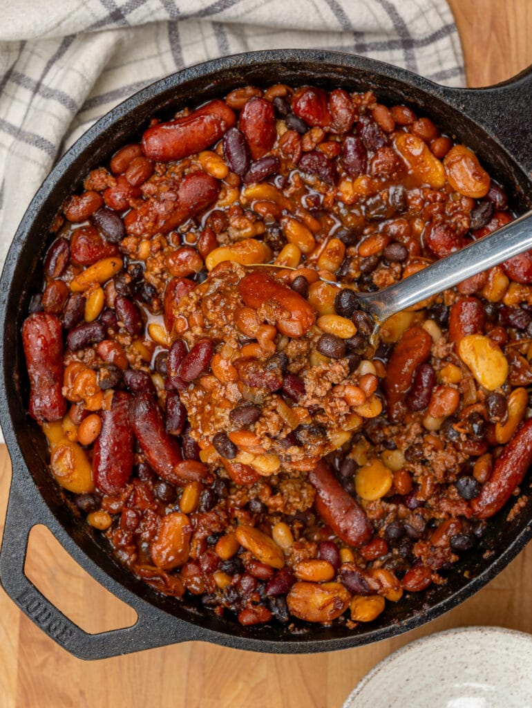 scooped baked beans with sausage