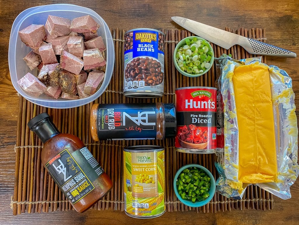 Ingredients to make smoked queso dip with leftover smoked brisket