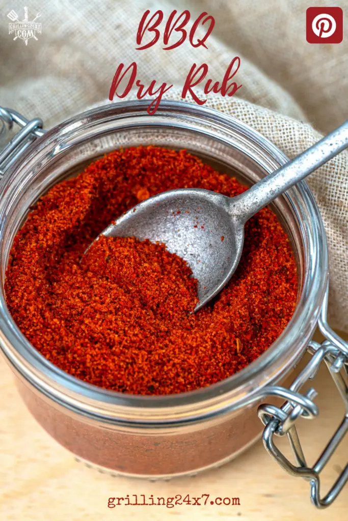 bbq dry rub in a glass container with a spoon