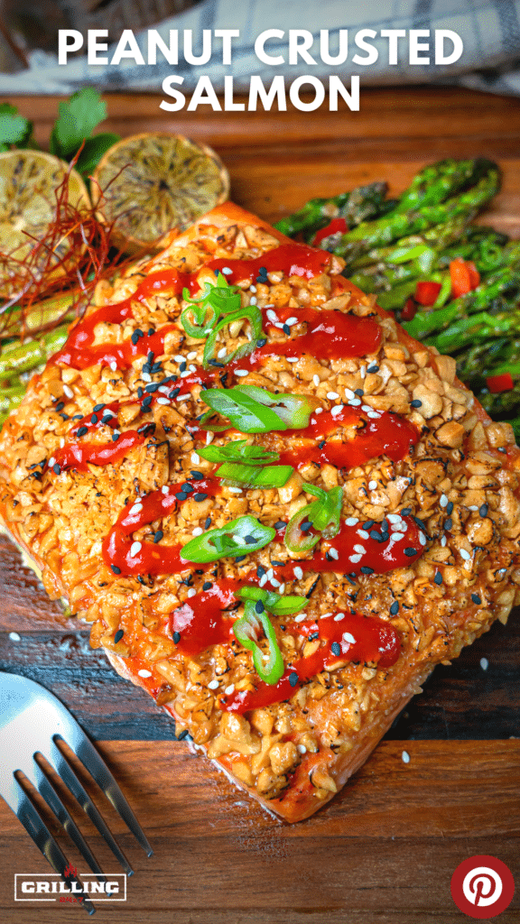 overhead shot of peanut crusted salmon toped with scallions sesame seeds and sriracha