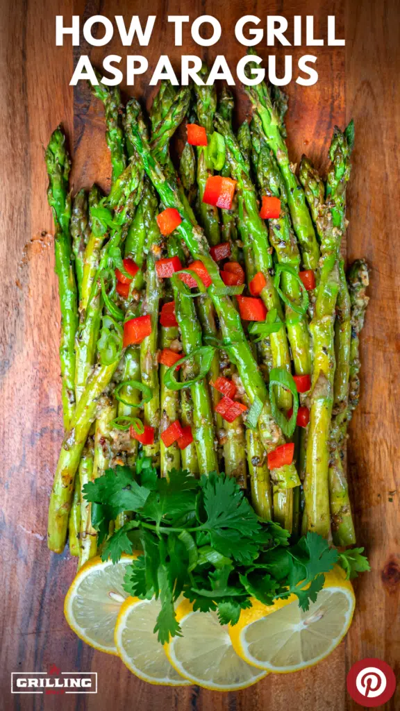 grilled asparagus plated on a wood cutting board