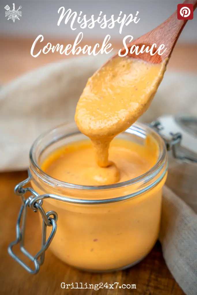 scooping comeback sauce out of a canister jar