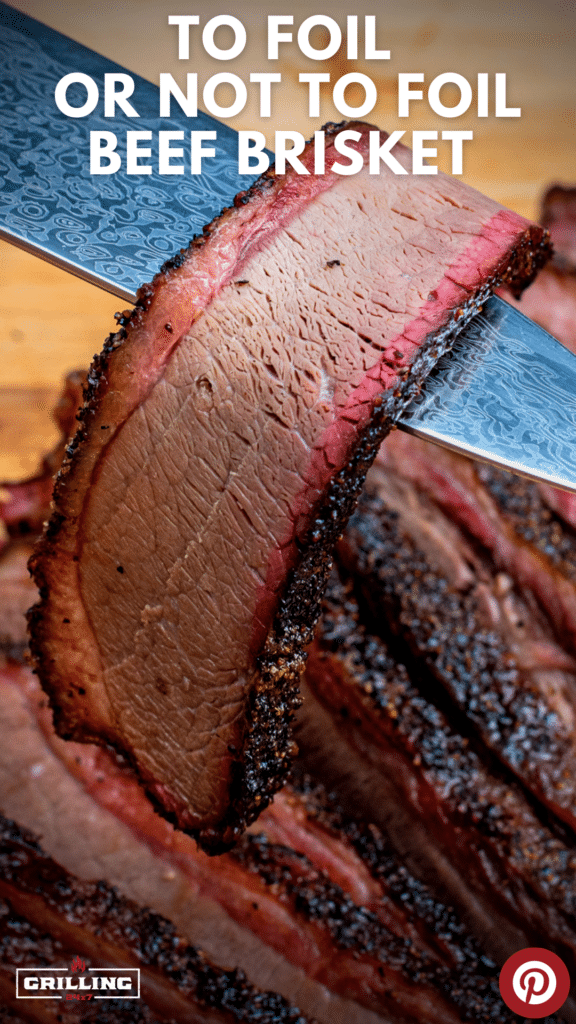 slice of brisket draped over a chef knife