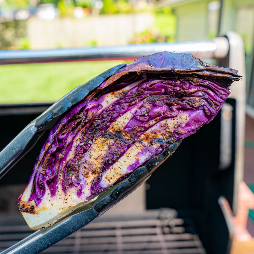 grilled red cabbage wedge on the grill