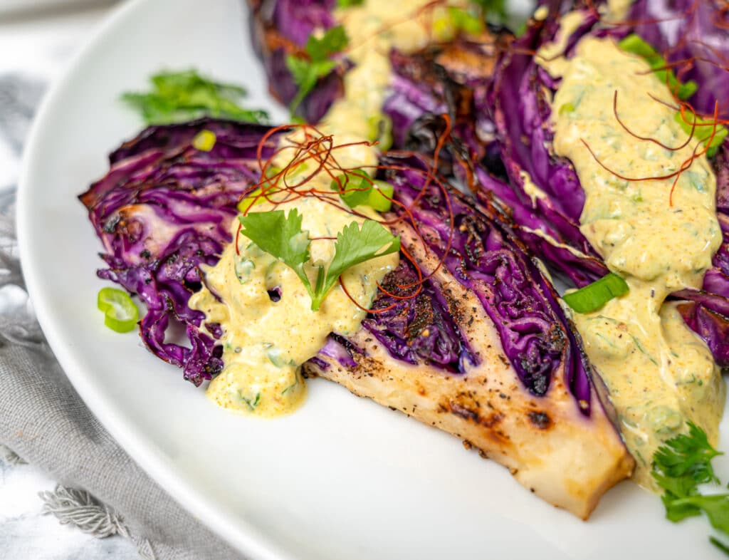 grilled red cabbage wedges with curry yogurt sauce
