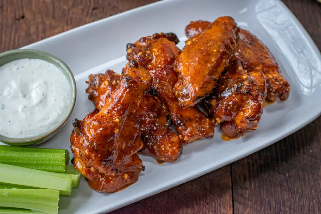 garlic parmesan wings with blue cheese and celery