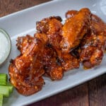 garlic parmesan wings with blue cheese and celery