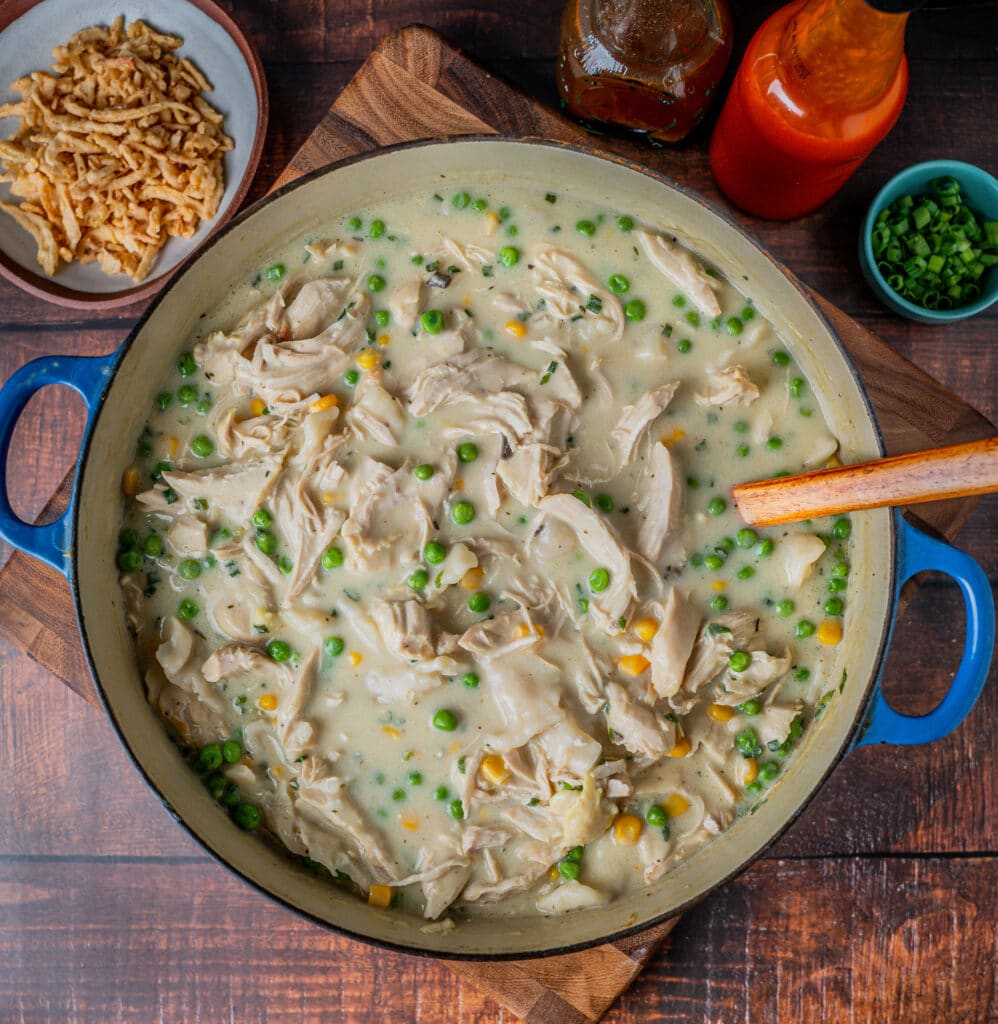 cast iron pot with chicken and dumplings