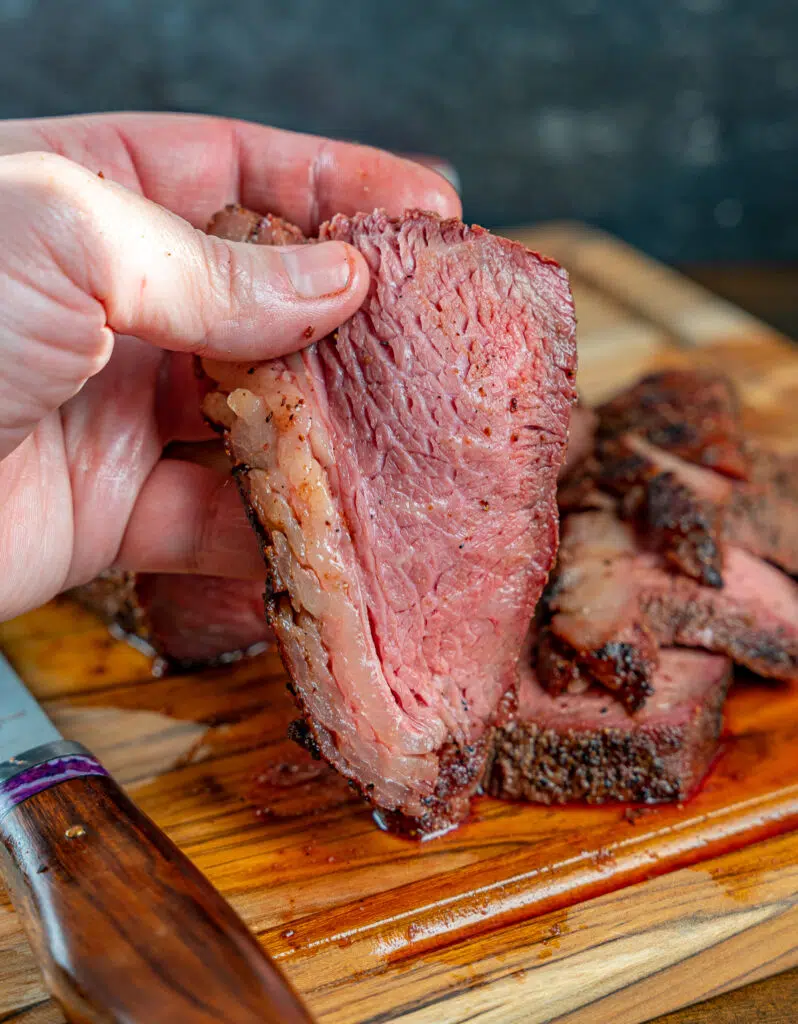 sliced smoked beef cap roast medium rare