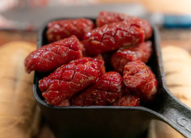 smoked hot dog burnt ends with bbq sauce