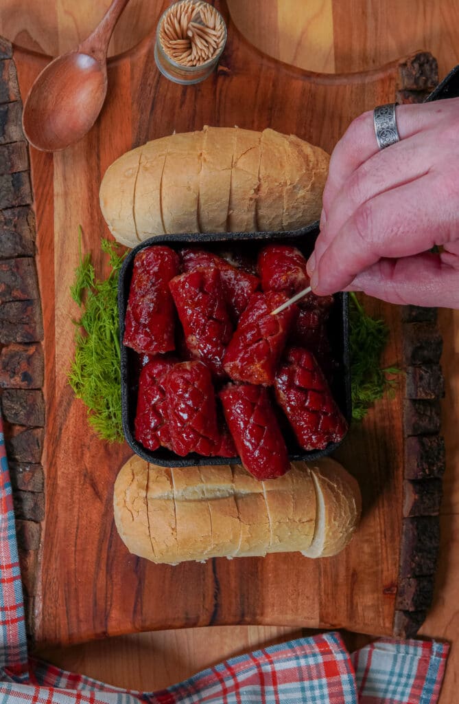 hot dog burnt ends with sweet and spicy sauce