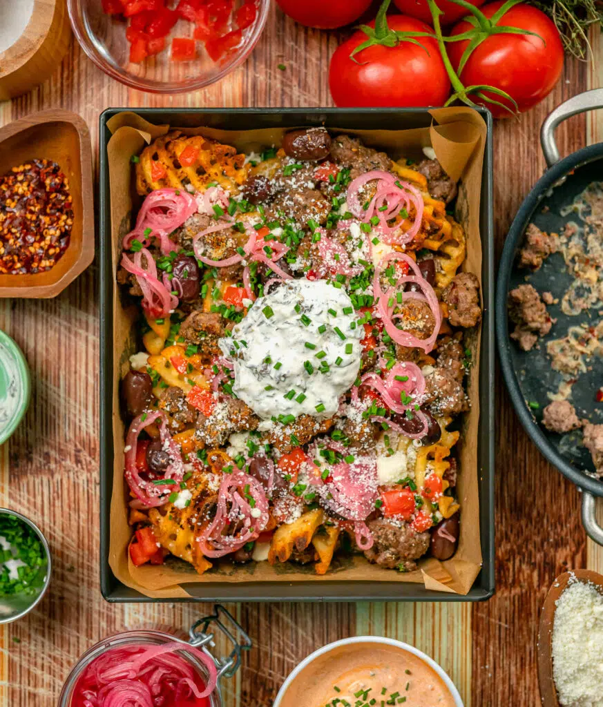 Ground Lamb Gyro Fries served in a 8x10 pizza pan