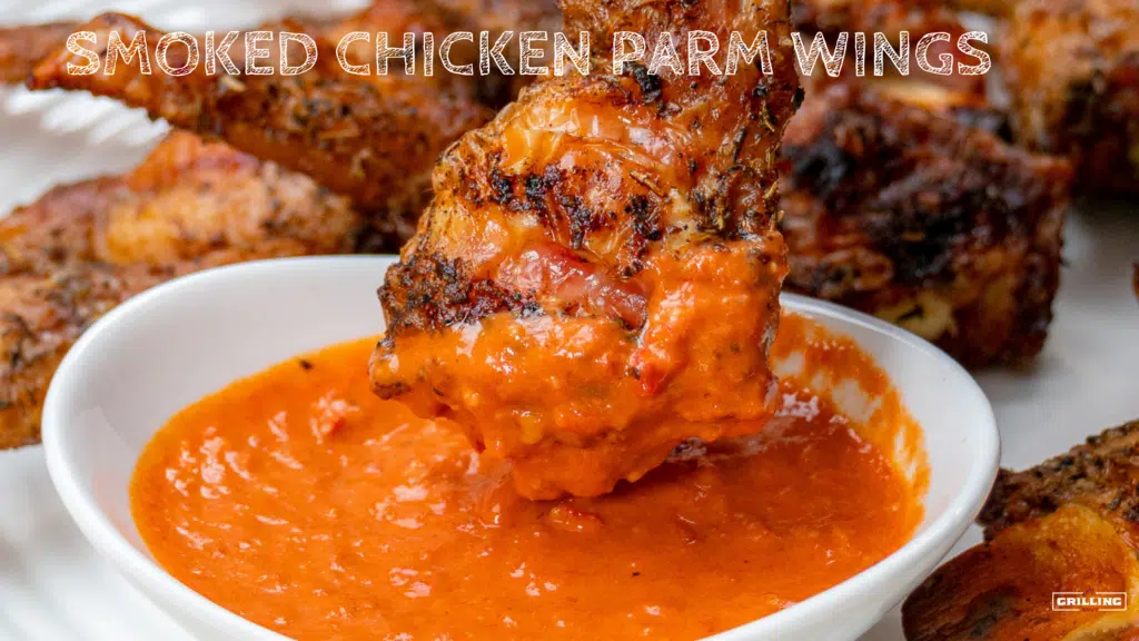 dipping smoked chicken part wing in vodka sauce