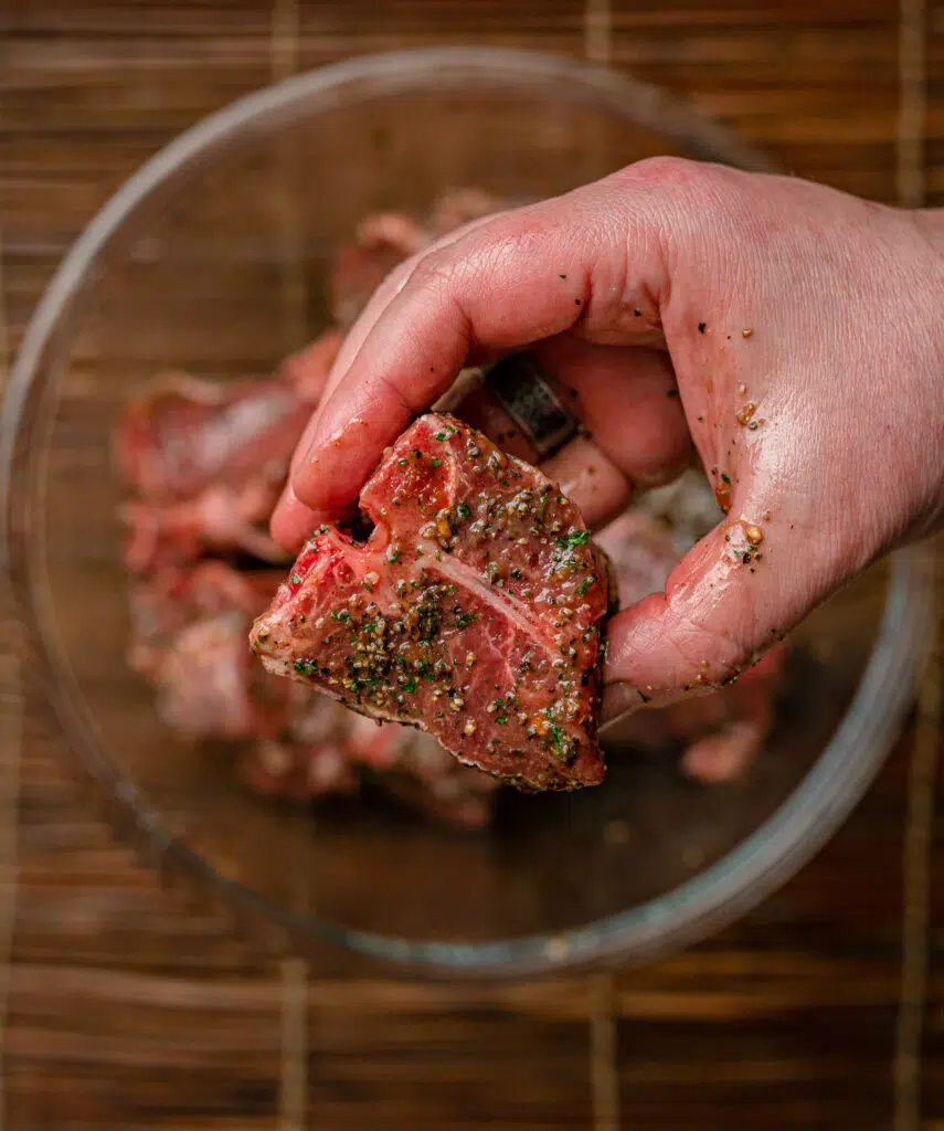 raw marinated lamb loin chop
