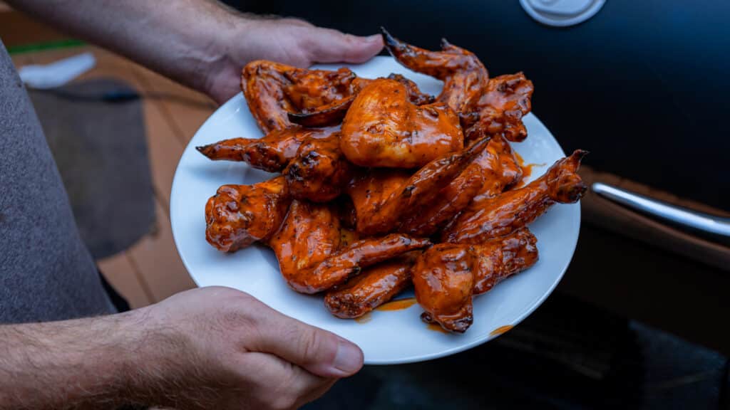 plate of 0-400 smoked chicken wings on a plate