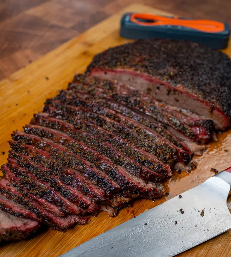 Sliced Beef brisket flat on a cutting board