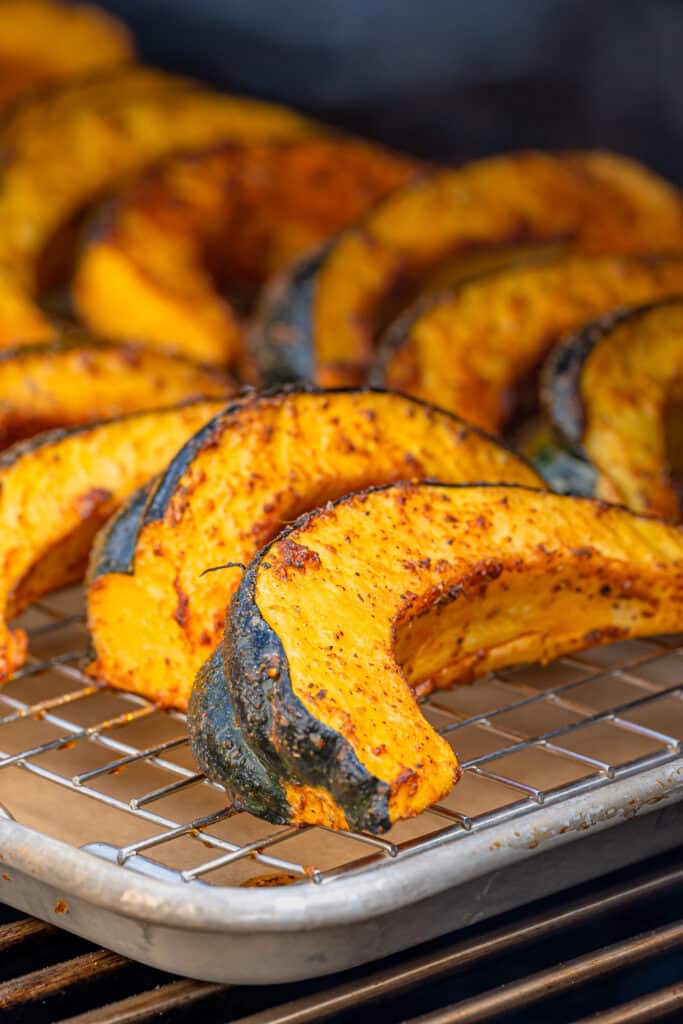 grilled acorn squash on a sheet pan