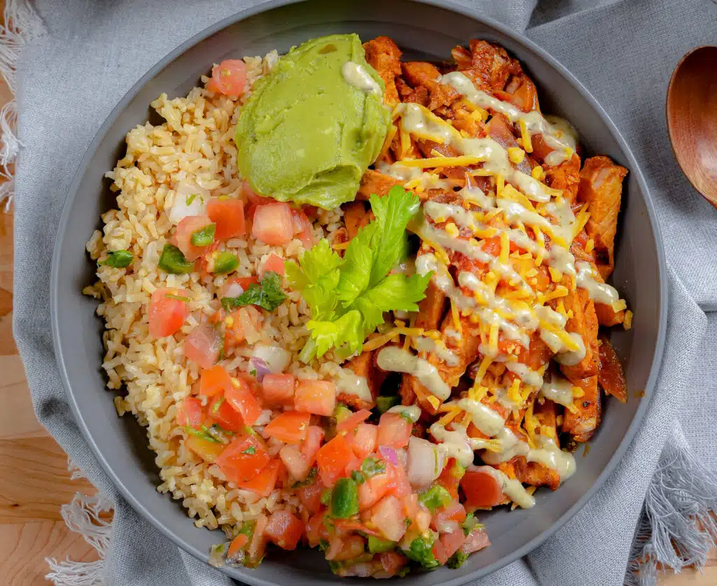 top down picture of an assembled pork burrito bowl