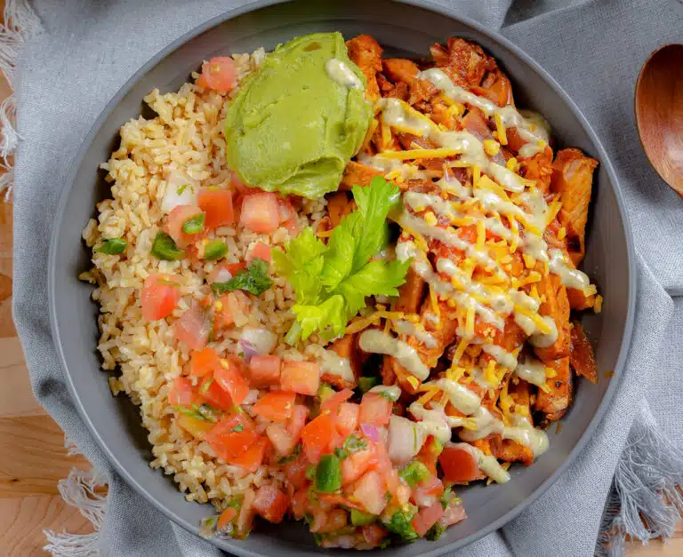 top down picture of an assembled pork burrito bowl